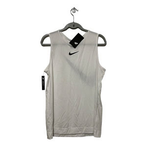 Nike loose fit white with black swoosh women's tank top. Size Medium NWTs